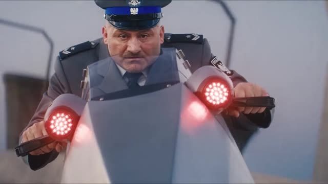 Crazy Frog AI clip: a stern cop on a white hover-bike with red lights