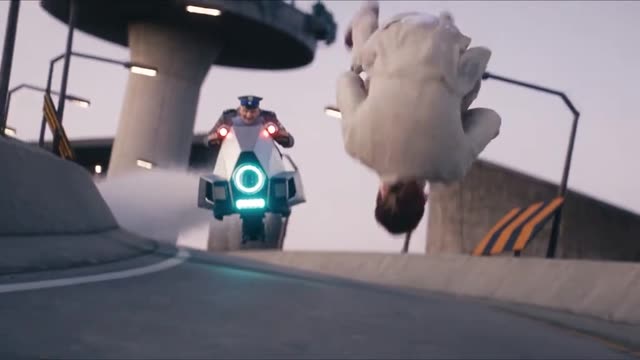 Crazy Frog AI clip: the rider flips upside down in mid-air in front of the hover-bike